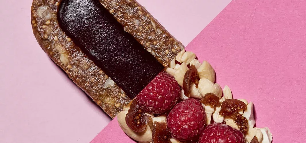 creative geometric pink food photography of a Bunch bar with raspberry flavour