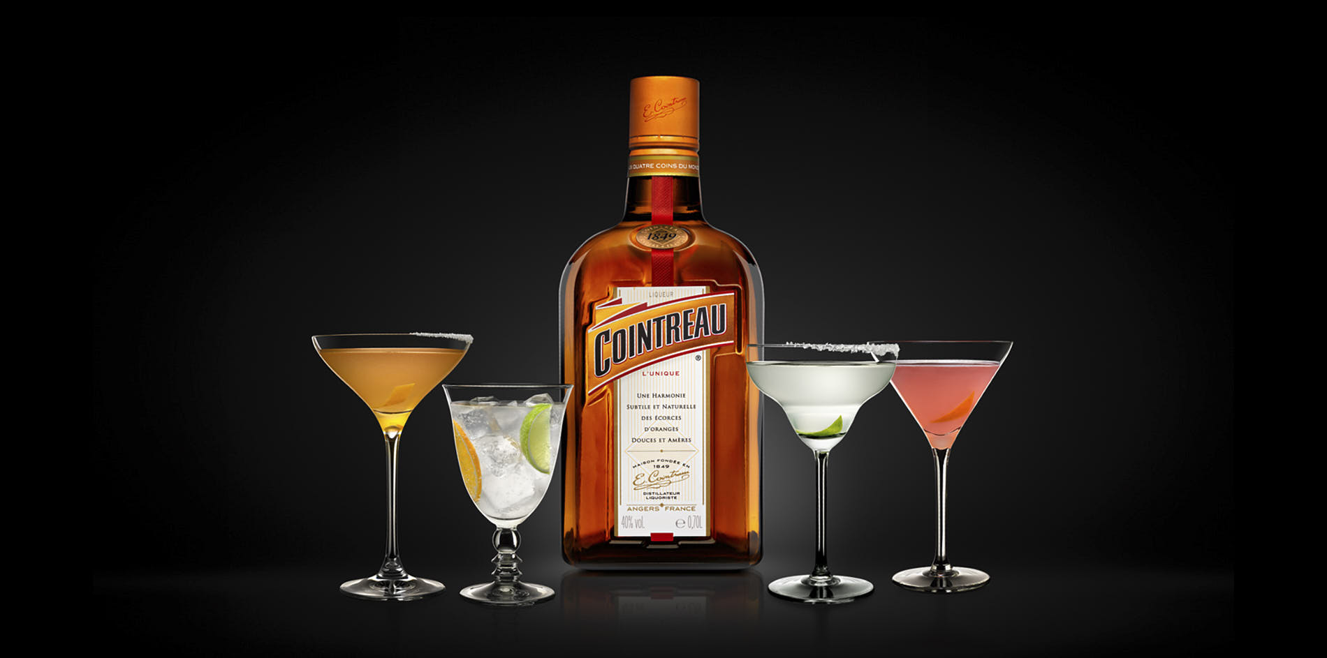 Four Cocktails With Styling And A Bottle Of Cointreau In The Middle